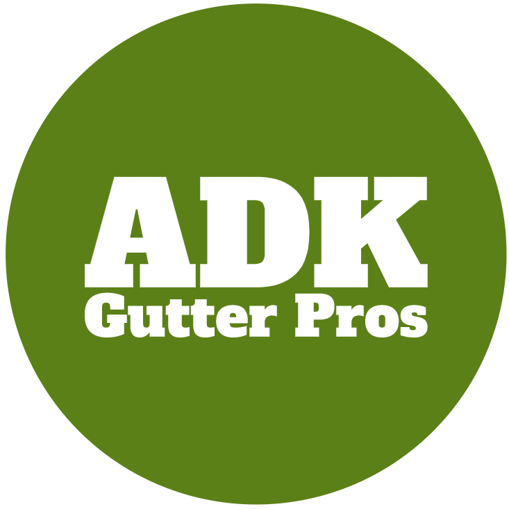 ADK Gutter Pros logo: white text on a green circle, reading