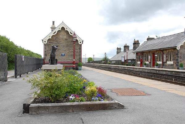 Blades Cottage railway Station with dog Ruswarp