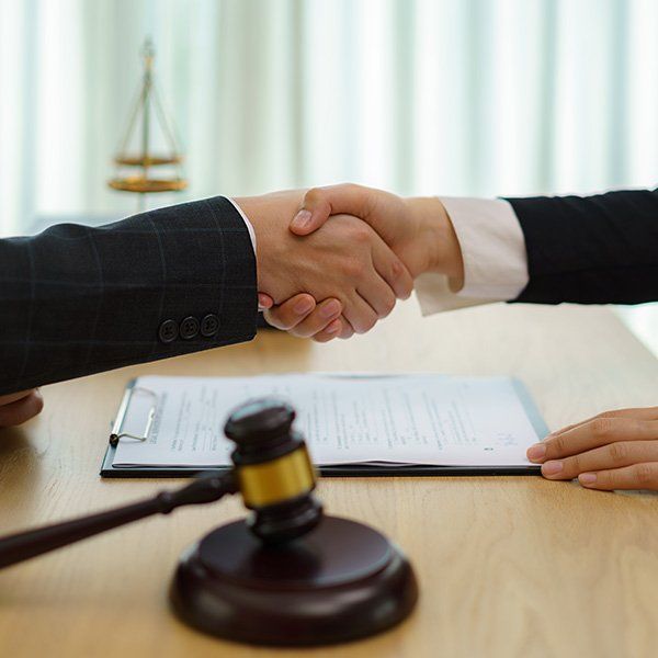 Consultation Between a Male Lawyer and Customer — Eugene, OR — Bromley Newton LLP