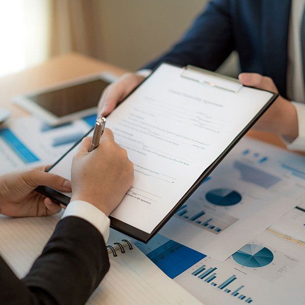 Business Partner Signing Contract — Eugene, OR — Bromley Newton LLP