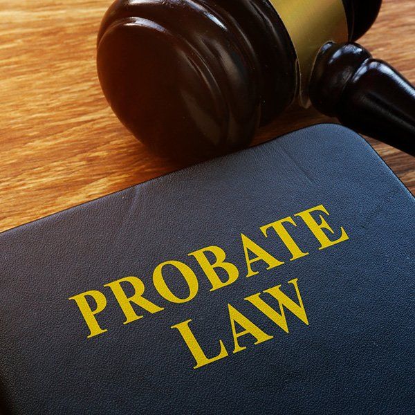 Probate Law Book and Wooden Gavel — Eugene, OR — Bromley Newton LLP