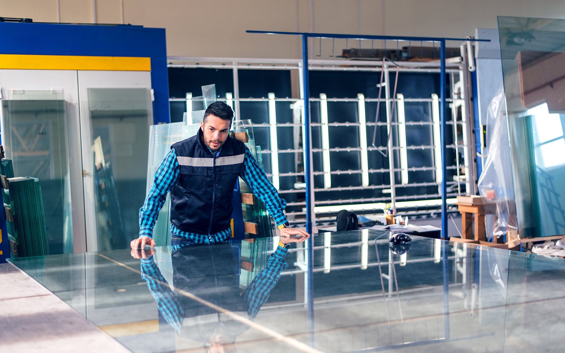 Man Holding The Big Glass — Mobile, AL — Southern Glass Inc.