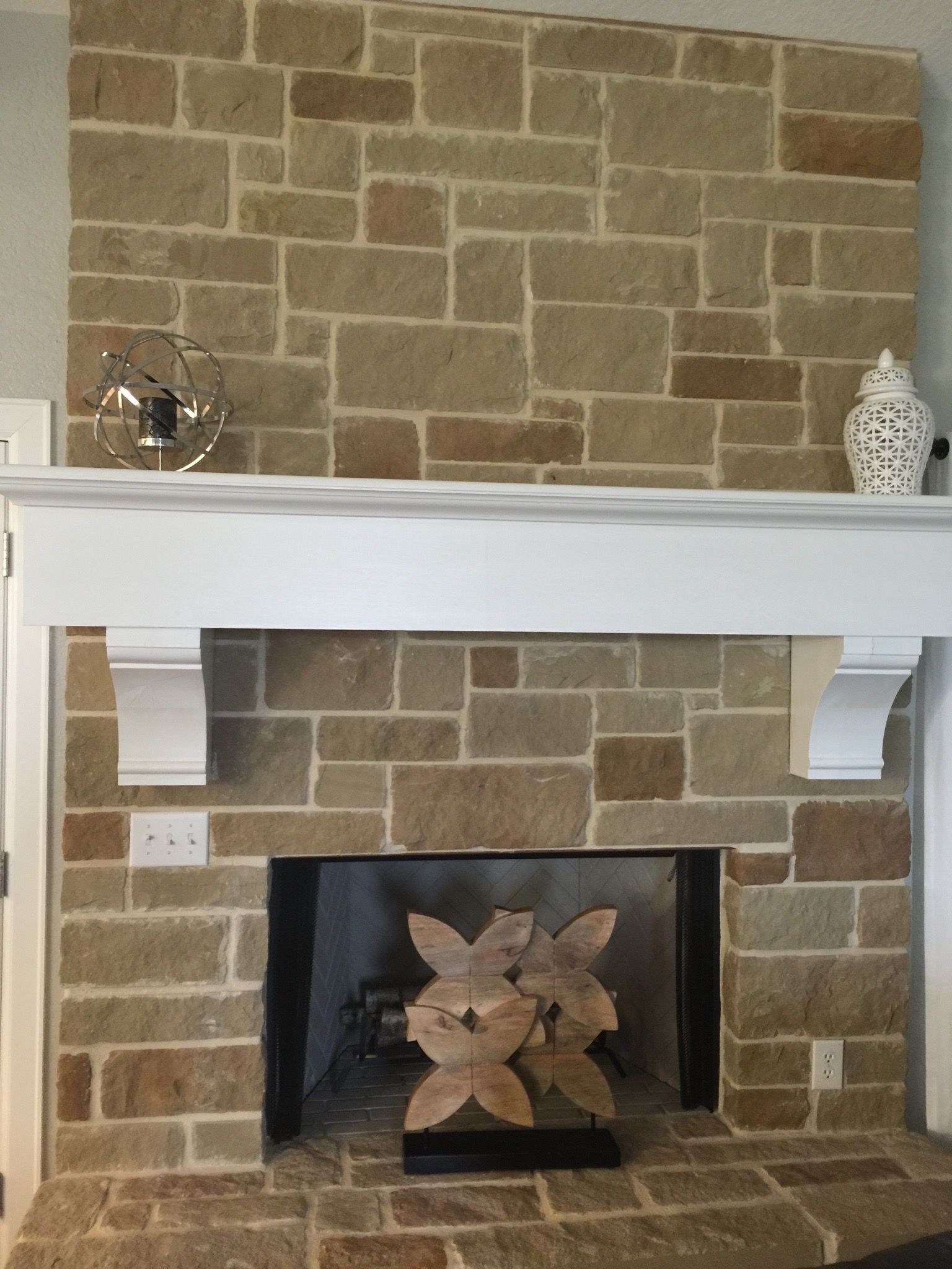 Stone fireplace inside living room