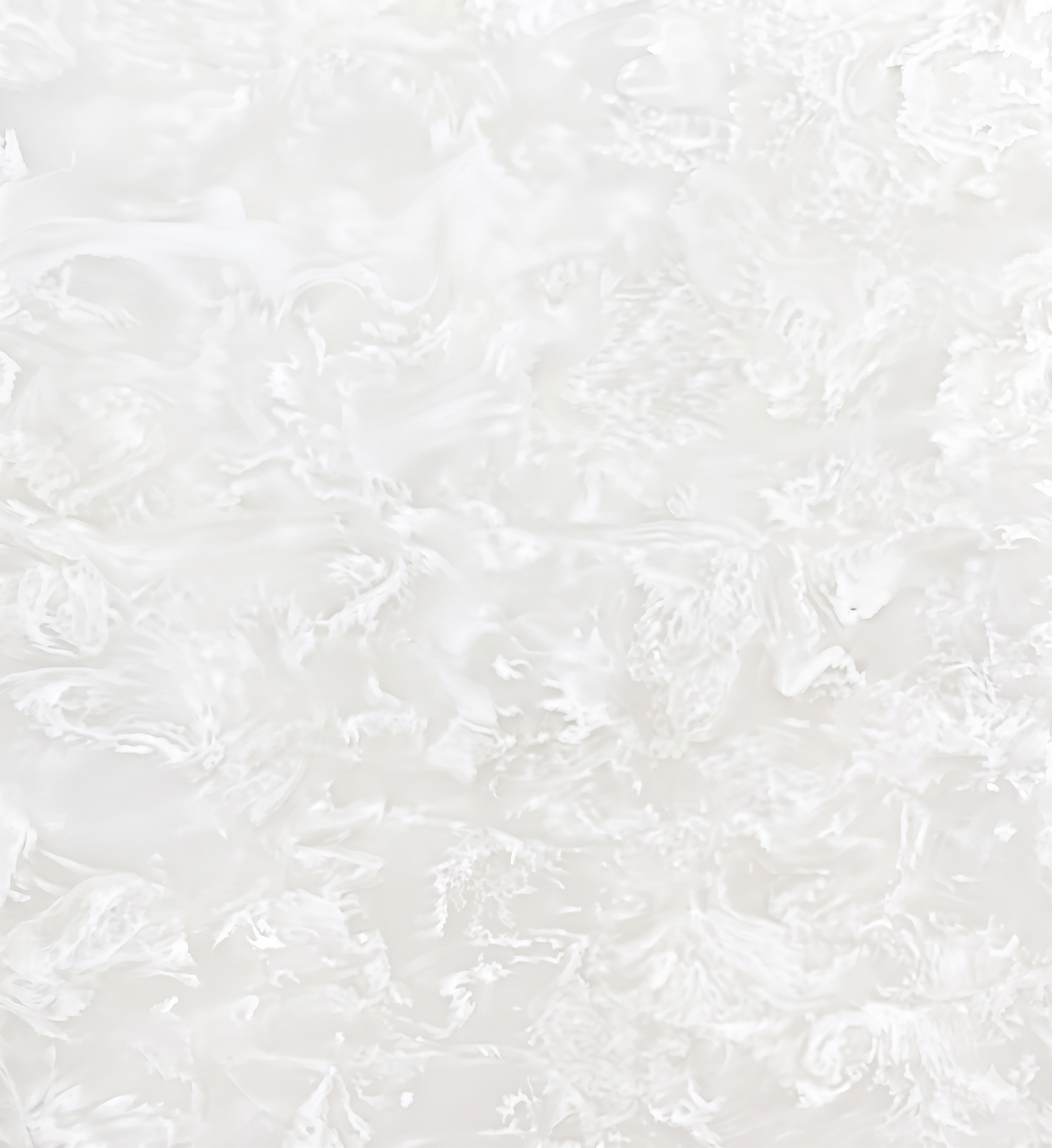 White fluffy texture, resembling crumpled fabric or soft fur, filling the frame.