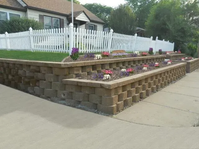 Plant beds & Retaining Wall - Moline, IL - C & J Landscaping