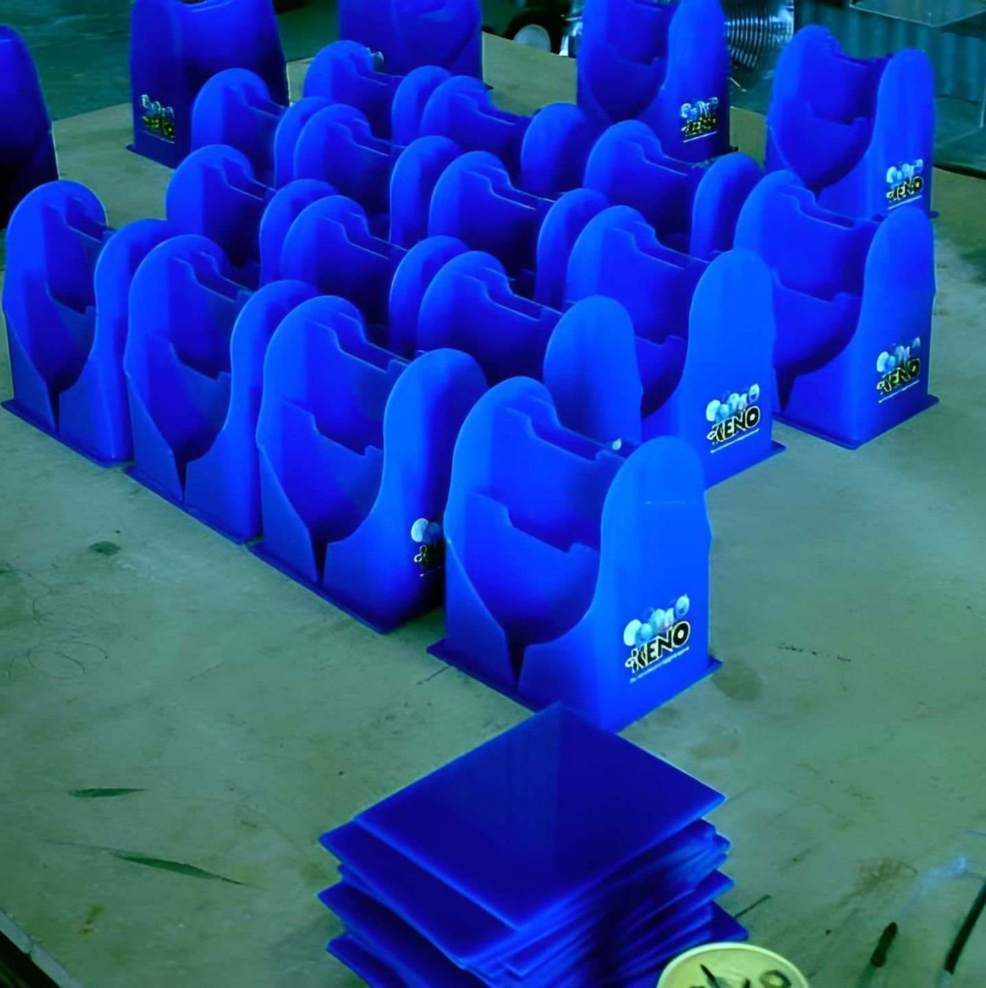 A Bunch Of Blue Chairs Are Sitting On A Table — Ram Star Plastics In Winnellie, NT