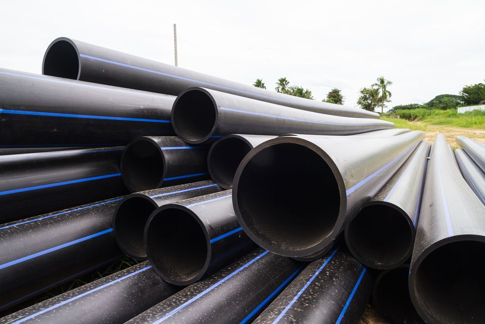 A Pile Of Plastic Pipes Stacked — Ram Star Plastics In Winnellie, NT