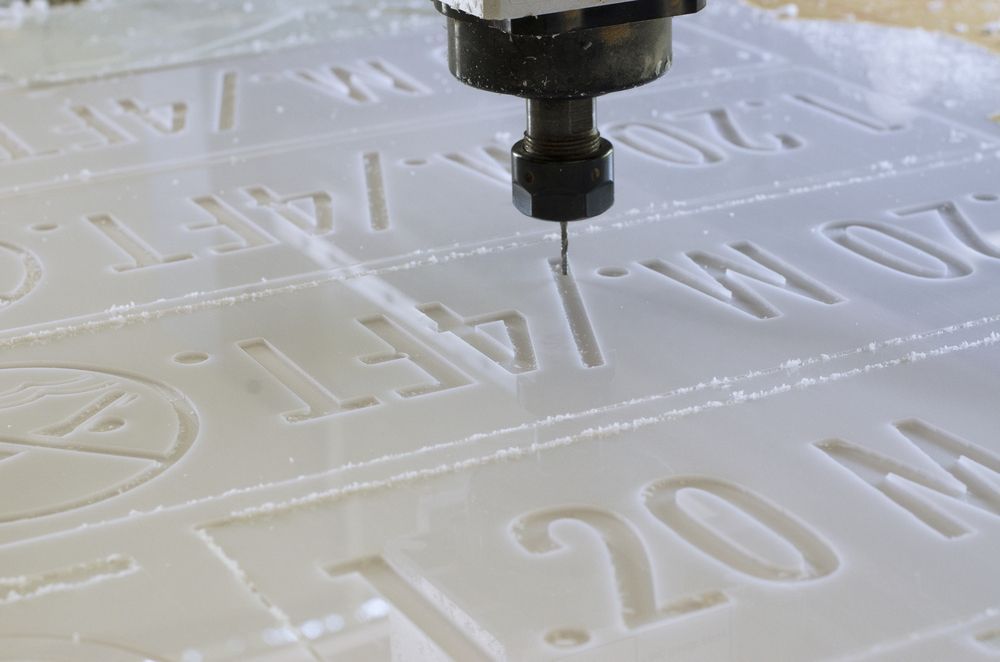 A Machine Is Cutting A Piece Of Acrylic — Ram Star Plastics In Winnellie, NT