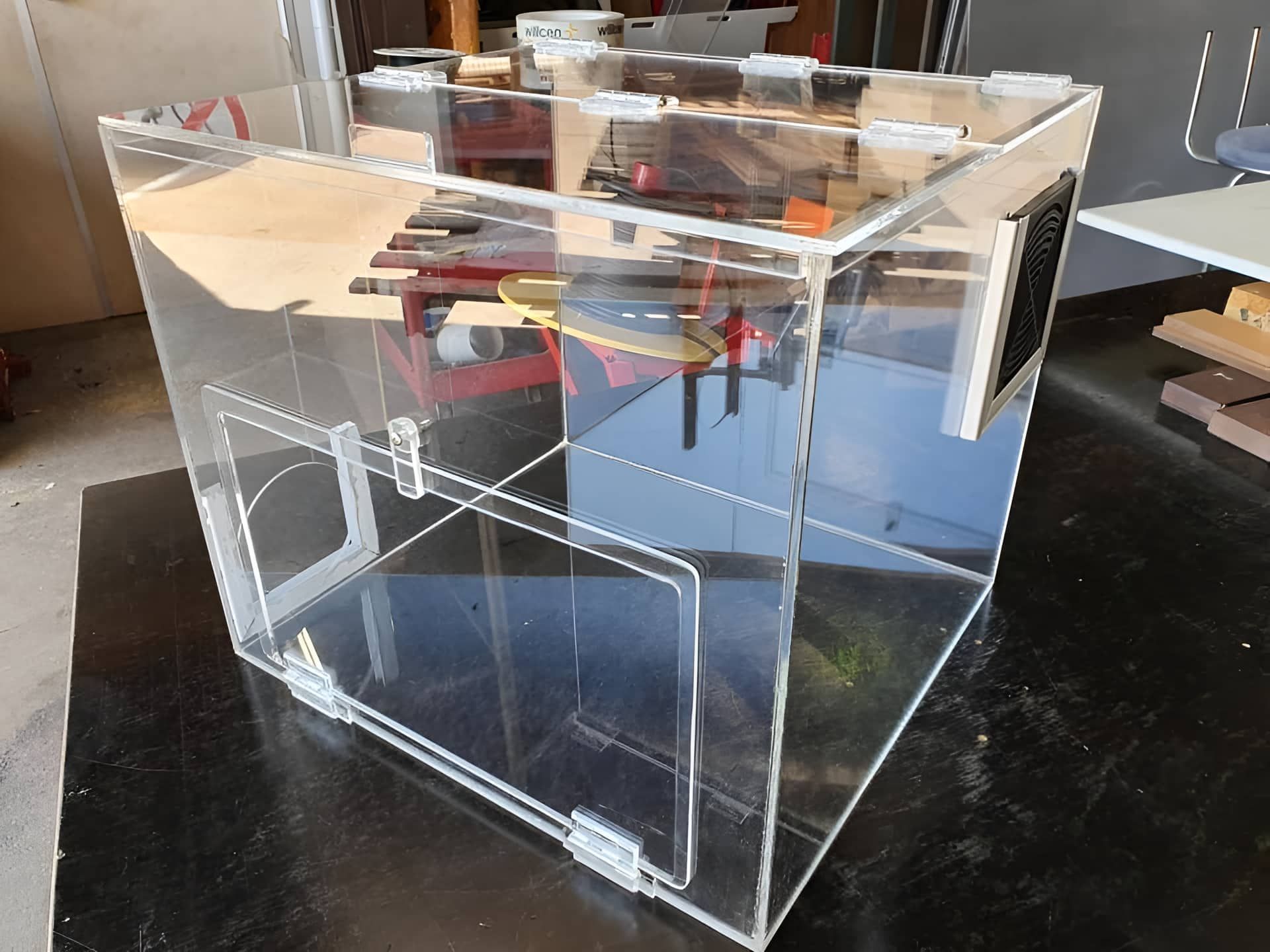 A Clear Acrylic Box Is Sitting On Top Of A Black Table — Ram Star Plastics In Winnellie, NT