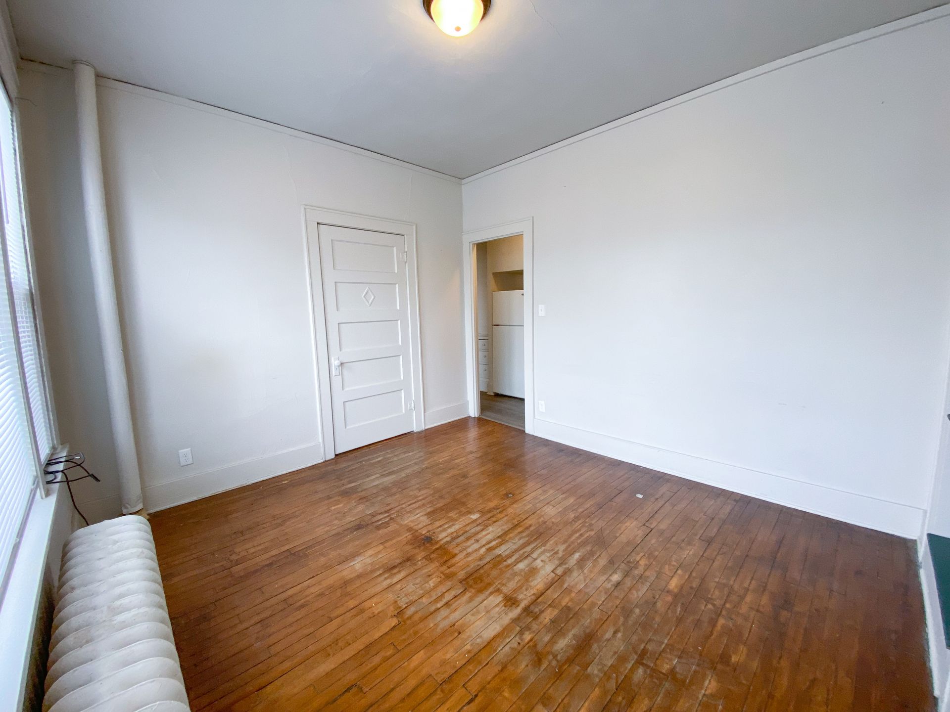 Interior view of a comfortable apartment unit at Unique Apartment Homes in Ames, IA, featuring spacious living areas and functional finishes
