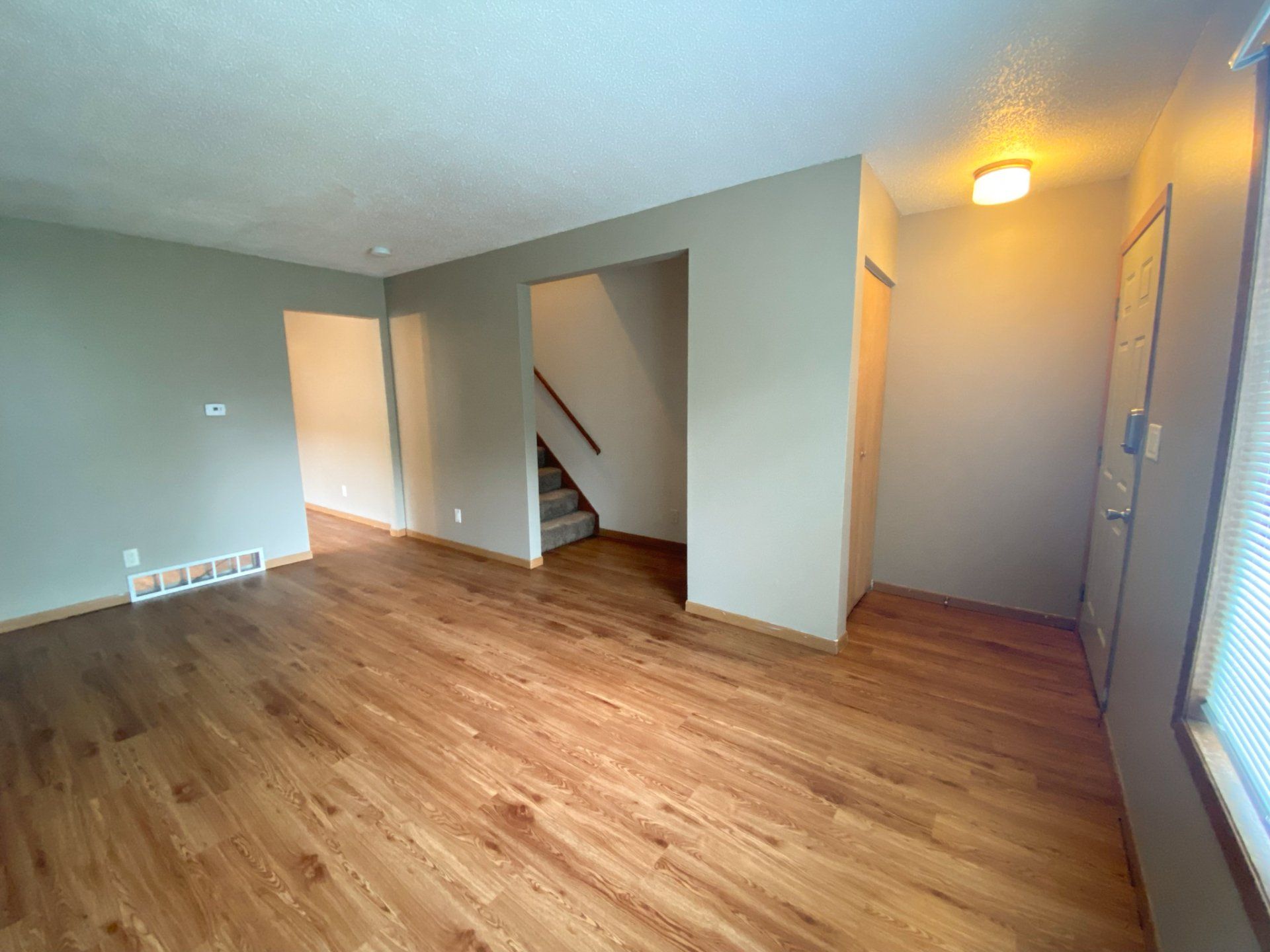 Interior view of a modern apartment unit at Unique Apartment Homes in Ames, IA, featuring spacious living areas and contemporary finishes
