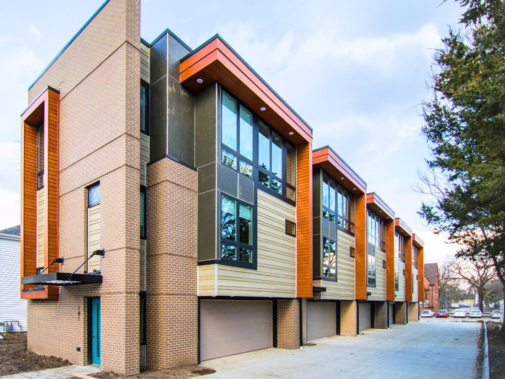 Exterior view of 316 Hayward, a townhouse building in Ames, IA offering convenient living spaces close to ISU amenities.