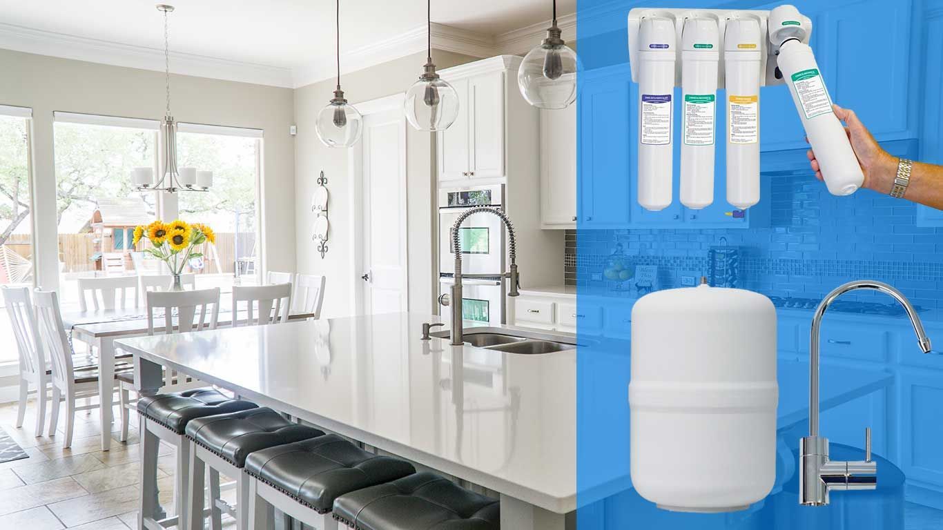 Kitchen with island and filtered water system components.