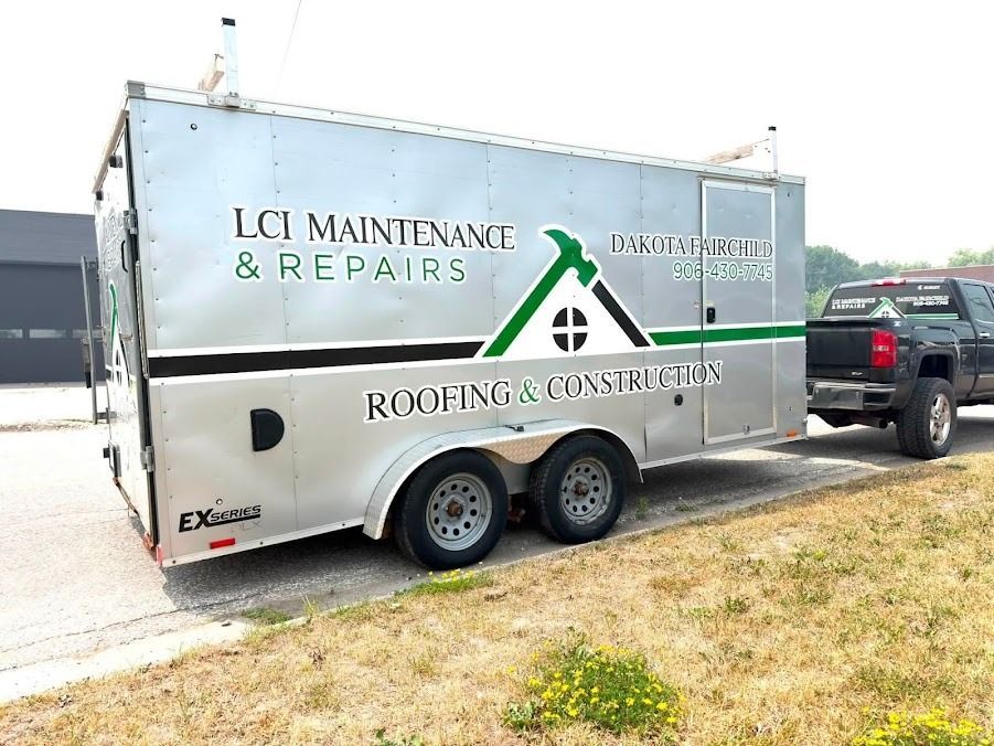 White LCI Maintenance & Repairs roofing trailer with green logo parked beside a black pickup truck