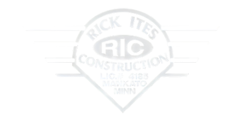 A white logo for rick ites construction on a white background.