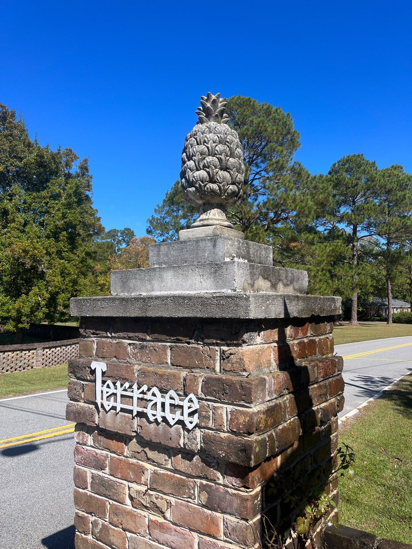 A brick pillar with the word terrace written on it