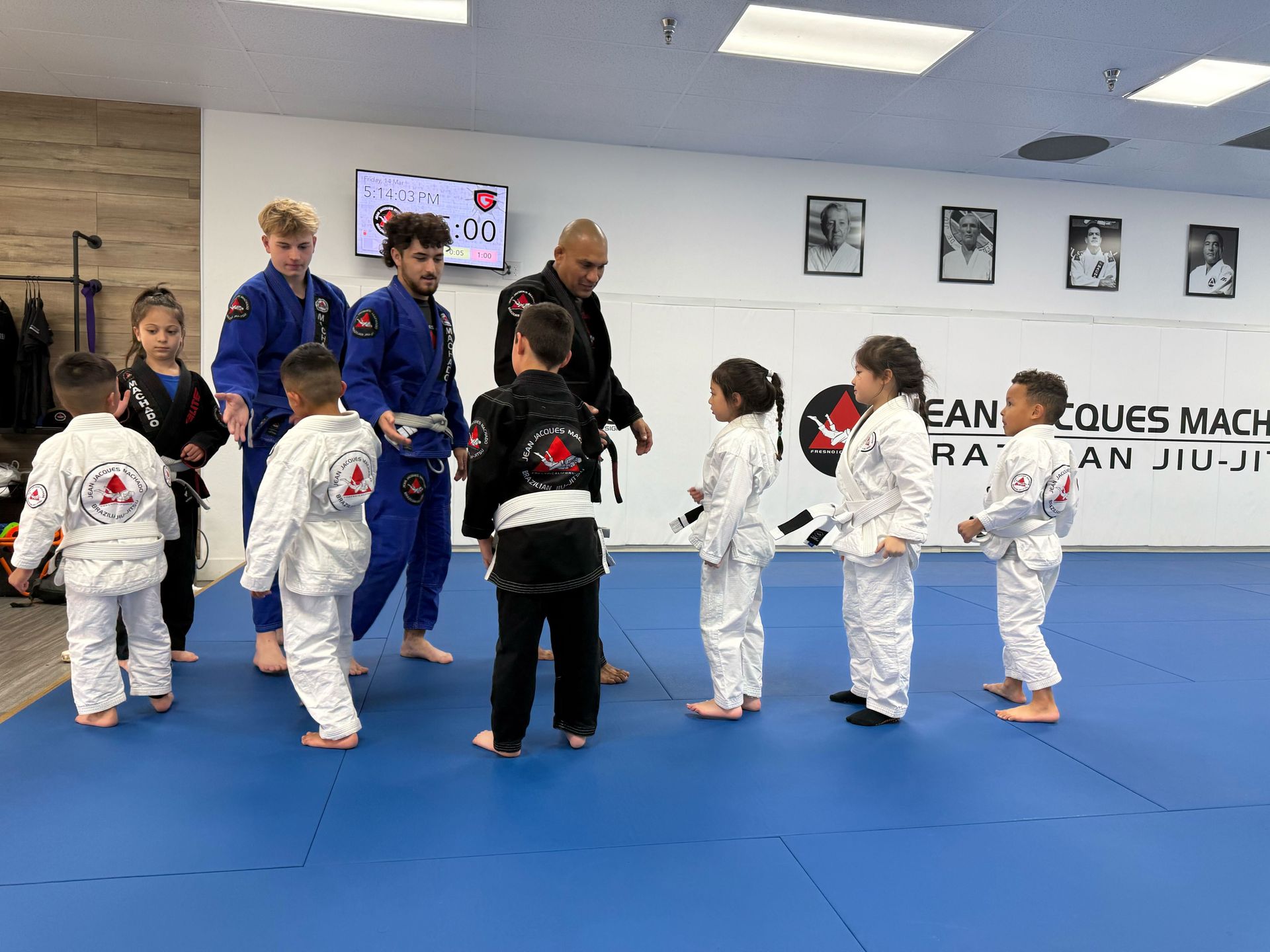 Students drilling Brazilian Jiu-Jitsu at Jean Jacques Machado Jiu-Jitsu Fresno in Fresno, CA to build confidence.