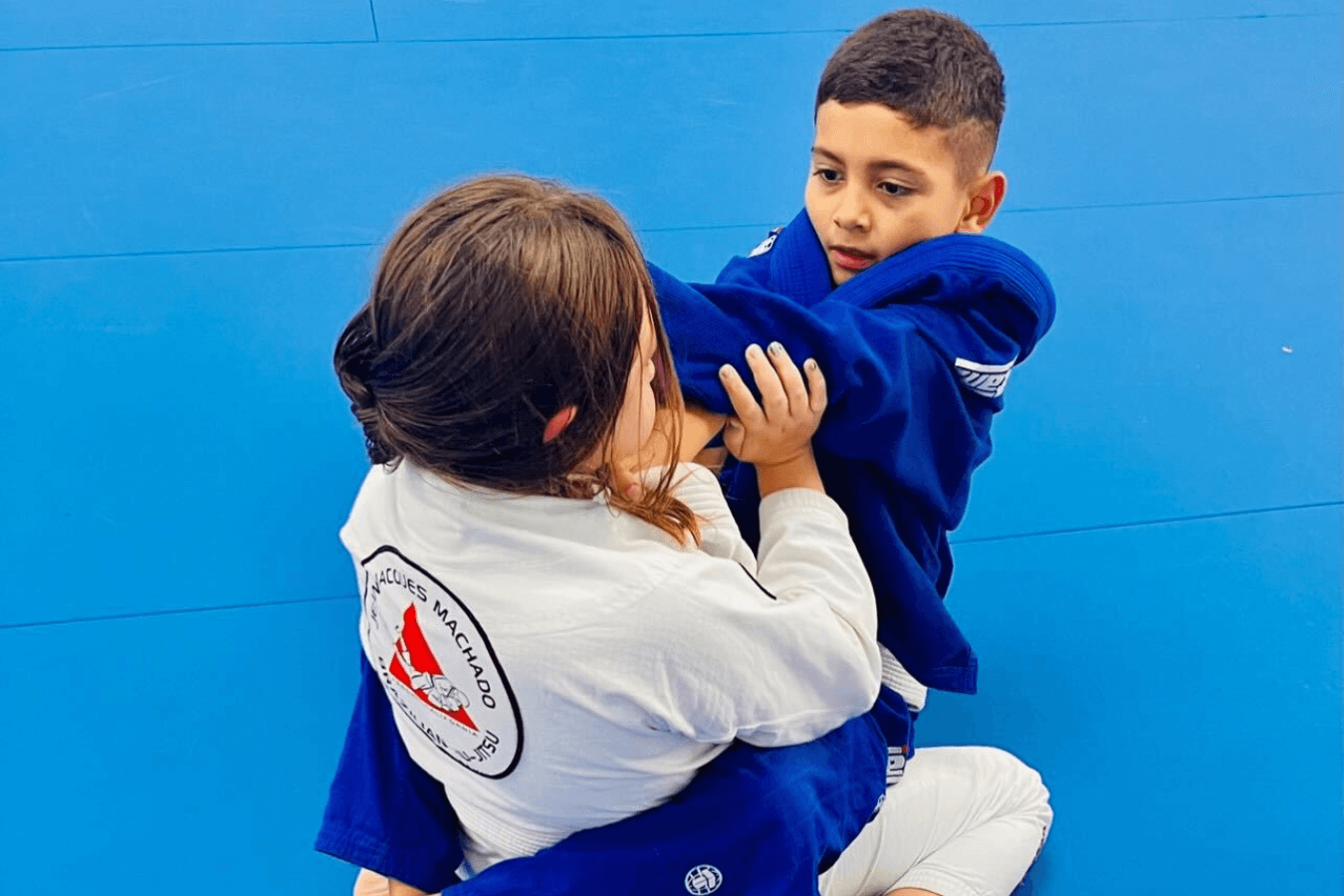 Kids practice Brazilian Jiu-Jitsu drills at Jean Jacques Machado Jiu-Jitsu Fresno, building focus and confidence in Fresno.