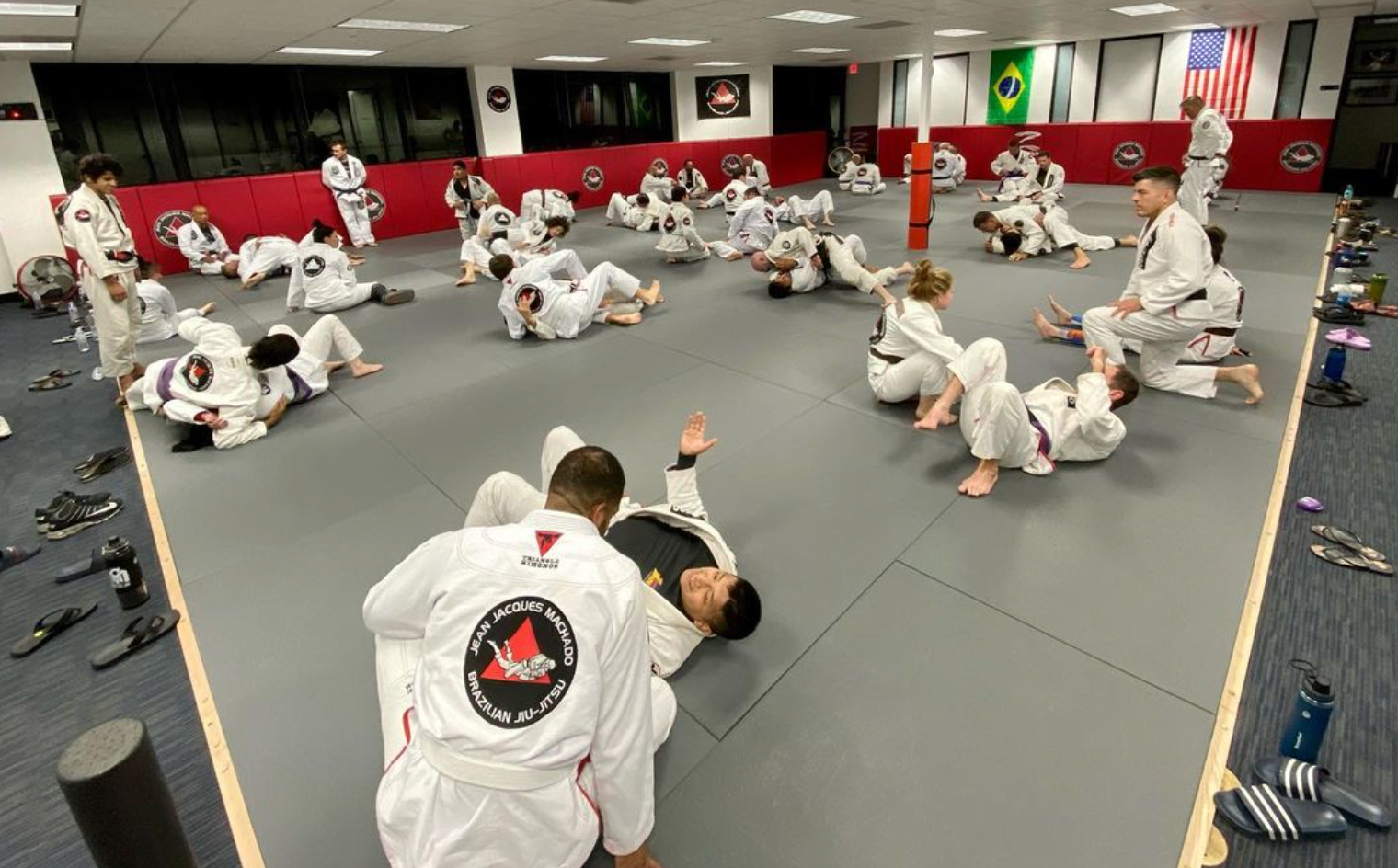 Beginners practicing Brazilian Jiu-Jitsu drills at Jean Jacques Machado Jiu-Jitsu Fresno in Fresno, CA for confidence and self-defense.