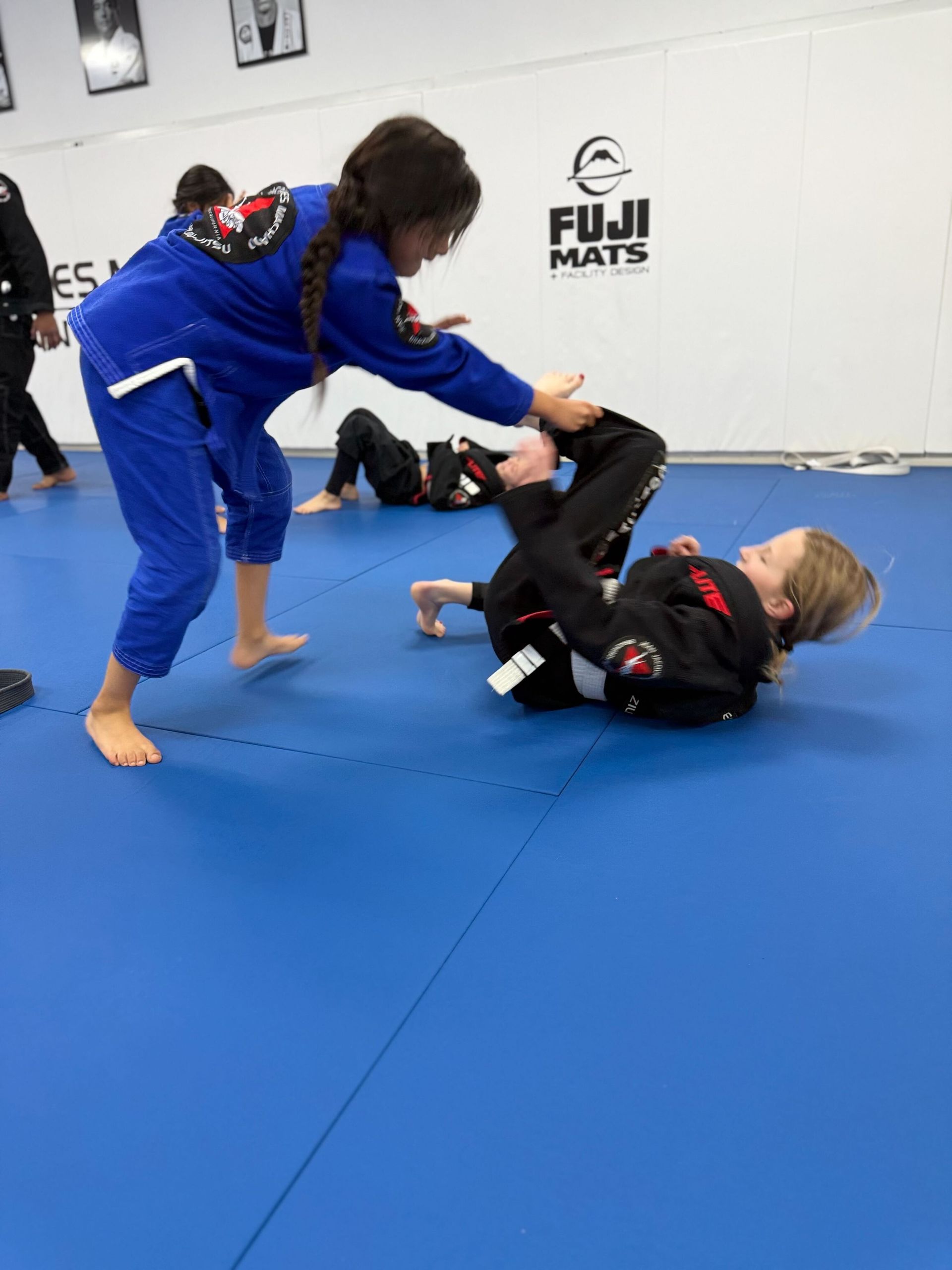 Students training Brazilian Jiu-Jitsu at Jean Jacques Machado Jiu-Jitsu Fresno in Fresno, CA, building goal skills.