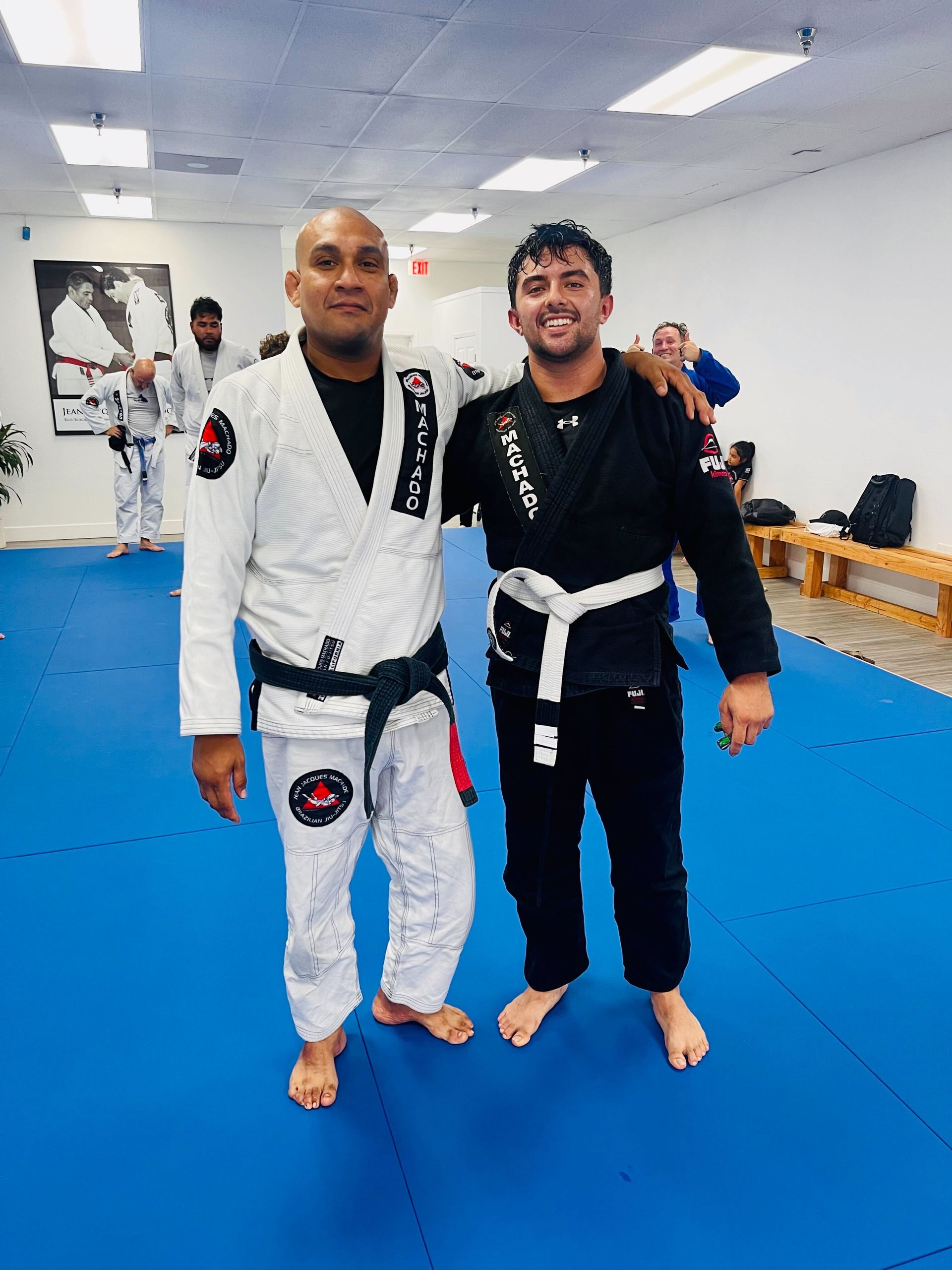 Students drilling Brazilian Jiu-Jitsu at Jean Jacques Machado Jiu-Jitsu Fresno in Fresno, CA to build strength and focus.