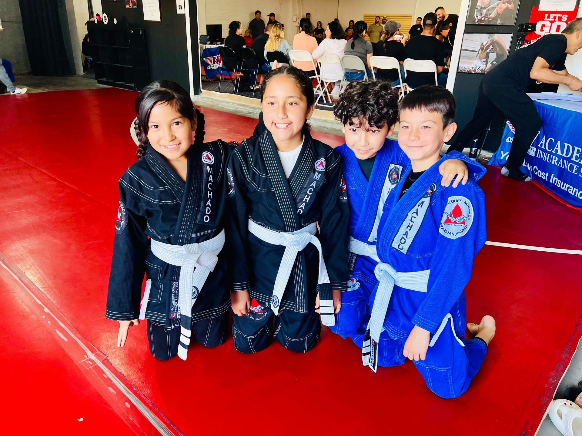 Children practicing Brazilian Jiu Jitsu at Jean Jacques Machado Fresno to build confidence, discipline, and healthy skills.