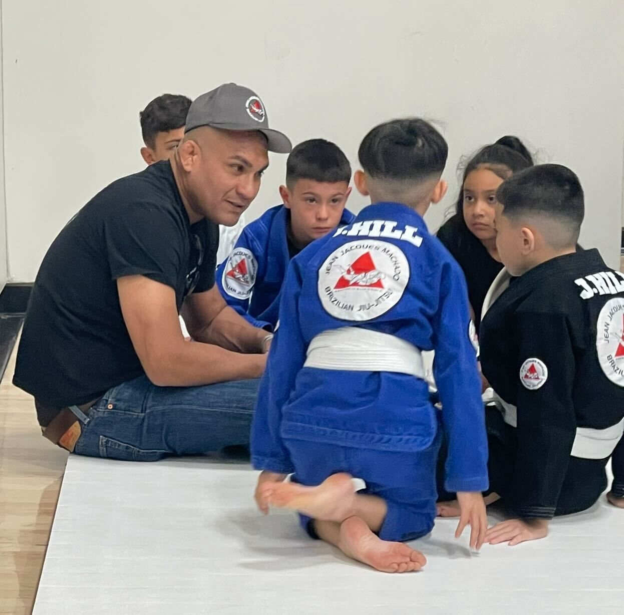 Kids practice safe grappling drills at Jean Jacques Machado Jiu-Jitsu Fresno in Fresno, CA, building confidence and focus.