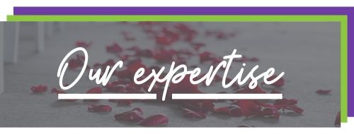 “Our expertise” text over a gray background with pink petals and a green border