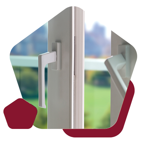 White window frames with sleek, modern handles, set against a blurred outdoor landscape view.