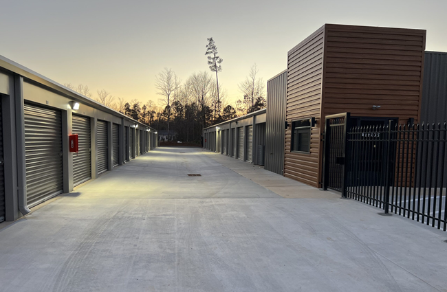 gated front entrance of anchored away storage facility