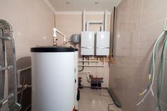 A Room with Two Boilers and a Water Heater in it — Scotts Valley, CA — George Allen & Sons Inc. Plumbing A Room with Two Boilers and a Water Heater in it — Scotts Valley, CA — George Allen & Sons Inc. Plumbing