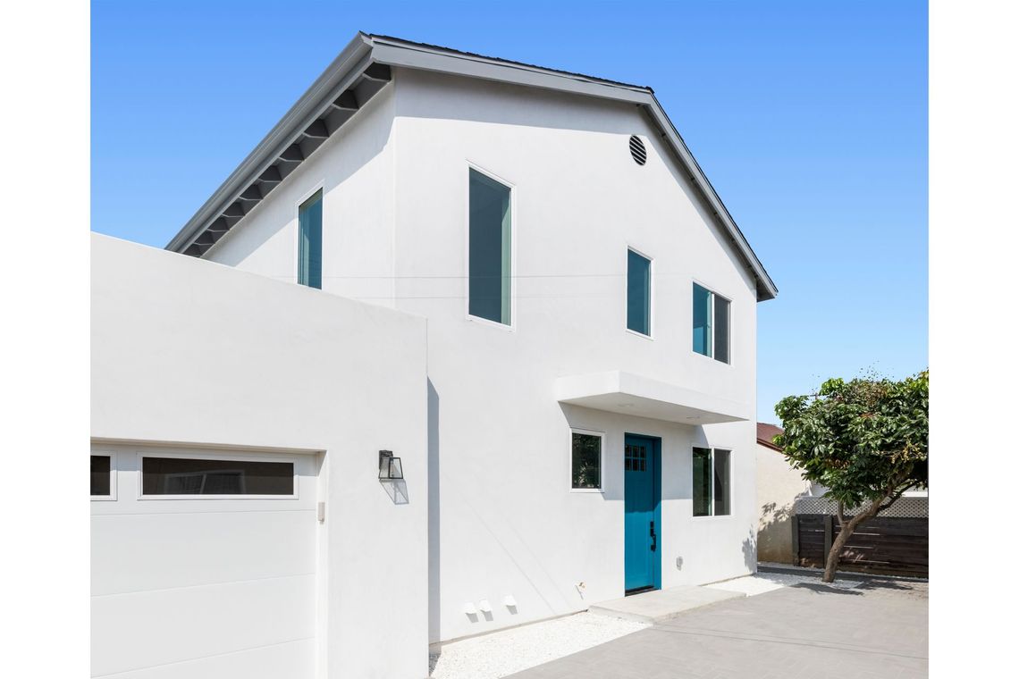 A 1200 square foot, three-bedroom, two story accessory dwelling unit (ADU) backyard home, attached to the newly rebuilt garage. 