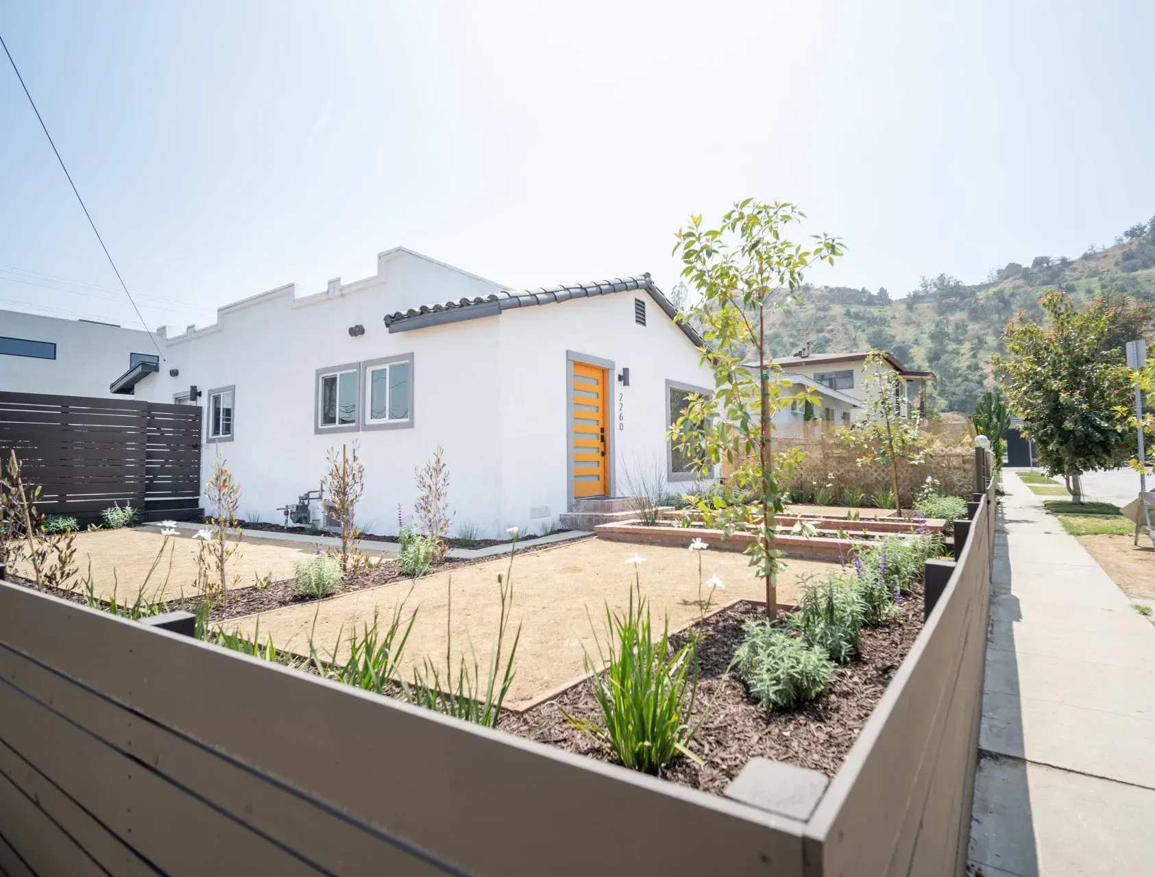 An accessory dwelling unit (ADU) granny flat with landscaping. 