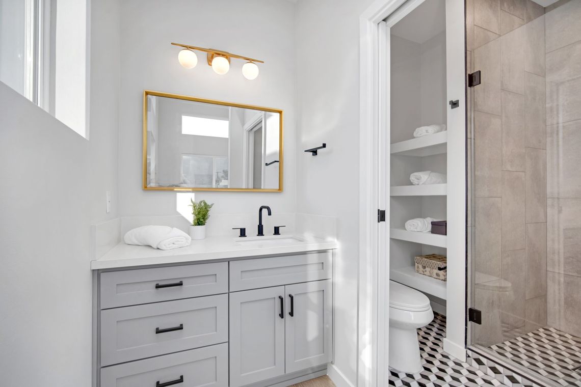 The private, ensuite, full bathroom in the master bedroom of an accessory dwelling unit (ADU) in Los Angeles, CA. 