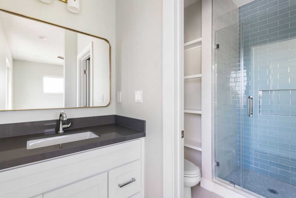 The private, ensuite, full bathroom in the master bedroom of an accessory dwelling unit (ADU) casita. 
