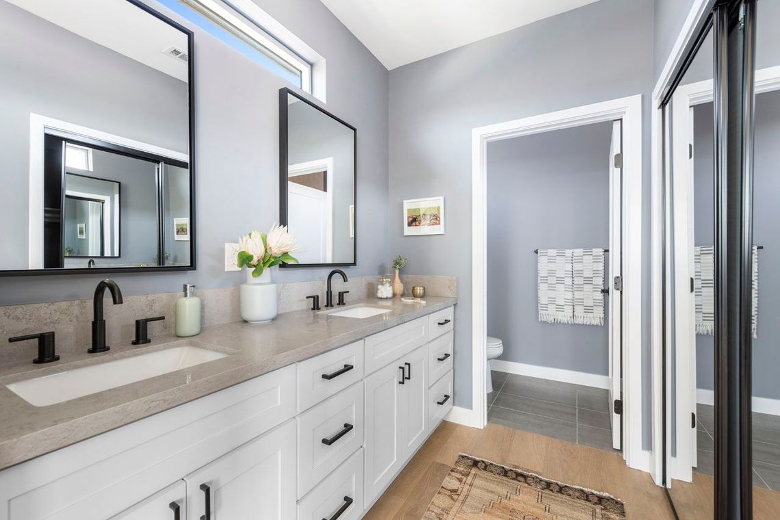 The private, ensuite, full bathroom in the master bedroom of an accessory dwelling unit (ADU) backyard home.