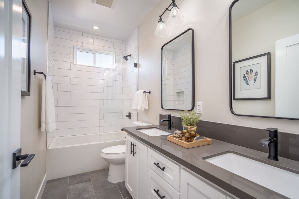 The private, ensuite, full bathroom in the master bedroom of a 1200 square foot, three-bedroom, two story accessory dwelling unit (ADU) in Los Angeles, CA. 