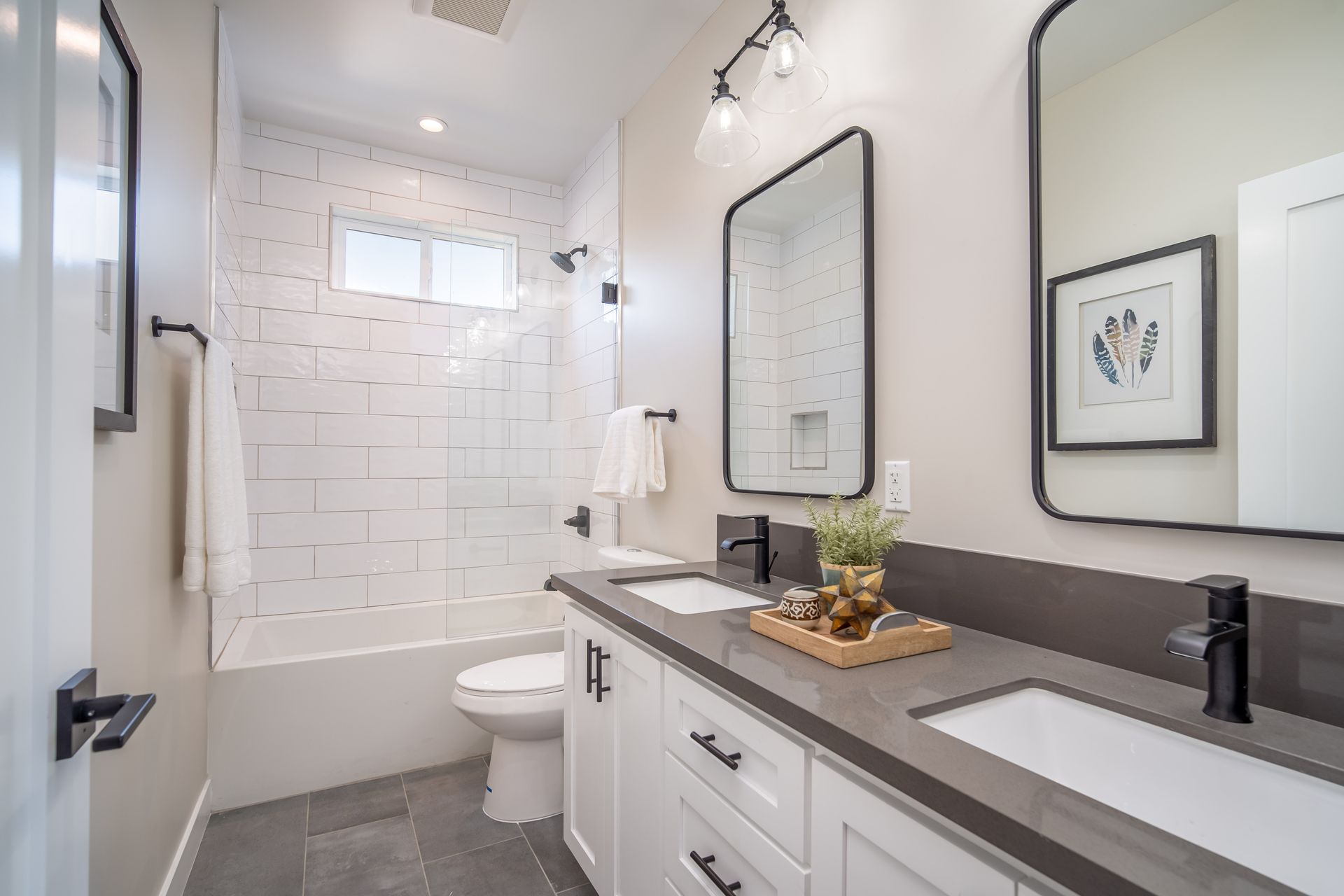 The private, ensuite, full bathroom in the master bedroom of an accessory dwelling unit (ADU) in-law suite.