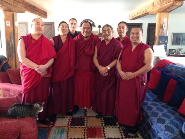 Tibetan Buddhist monks preparing to create a mandala at The Farmhouse