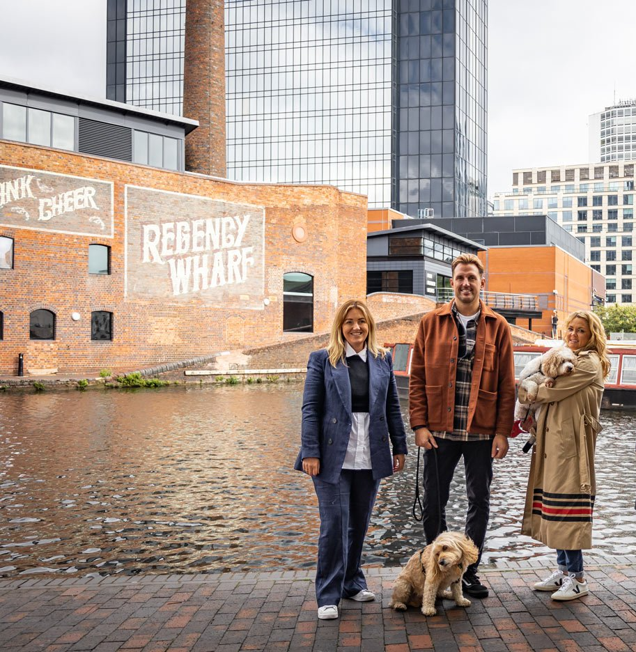 The Animal People team near a river in Birmingham