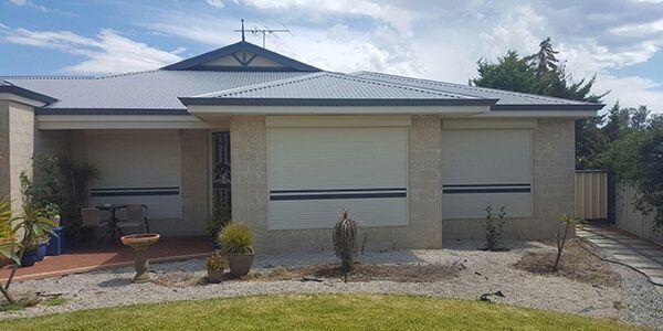 House with Roller Shutter — Goulburn, NSW — Sun Solutions Home Improvement