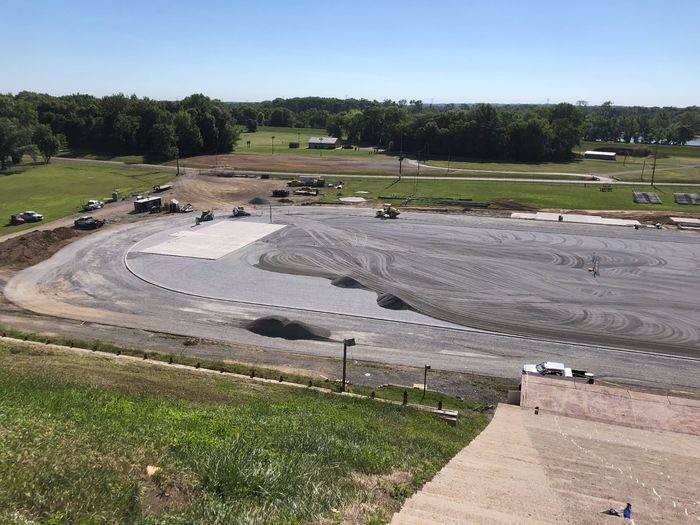 A running track with a white line on the side of it.