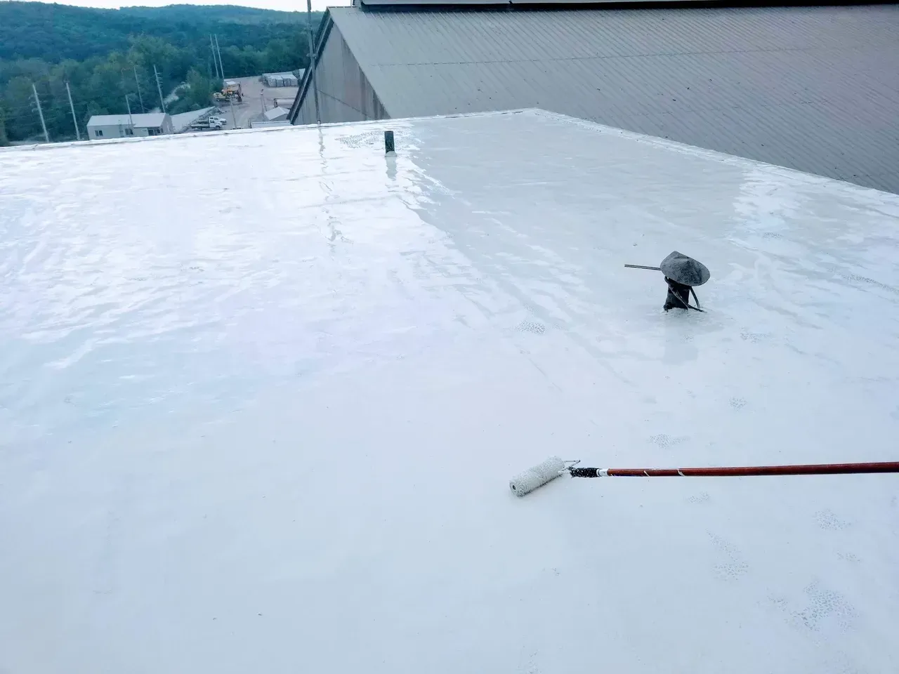 Flat roof maintenance on a commercial building