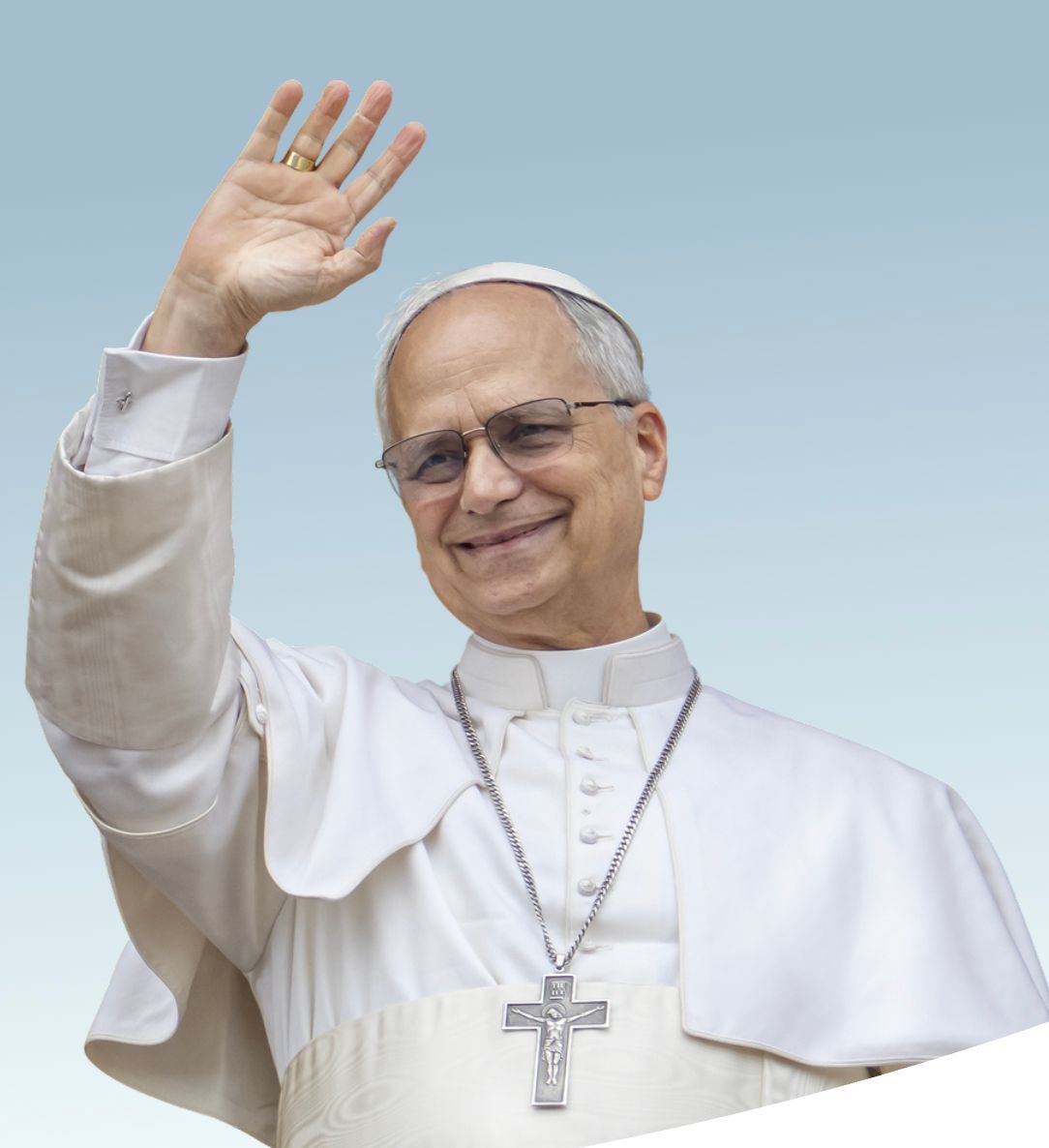 Pope in white robes waves against a blue sky, wearing a cross necklace.