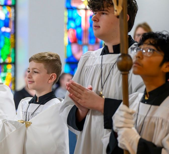 Preparing to serve at Fr. Steven's installation Mass.