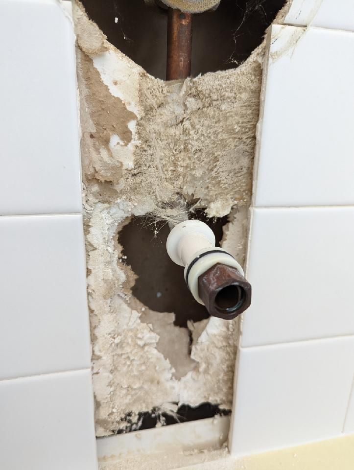 Broken tile in shower 