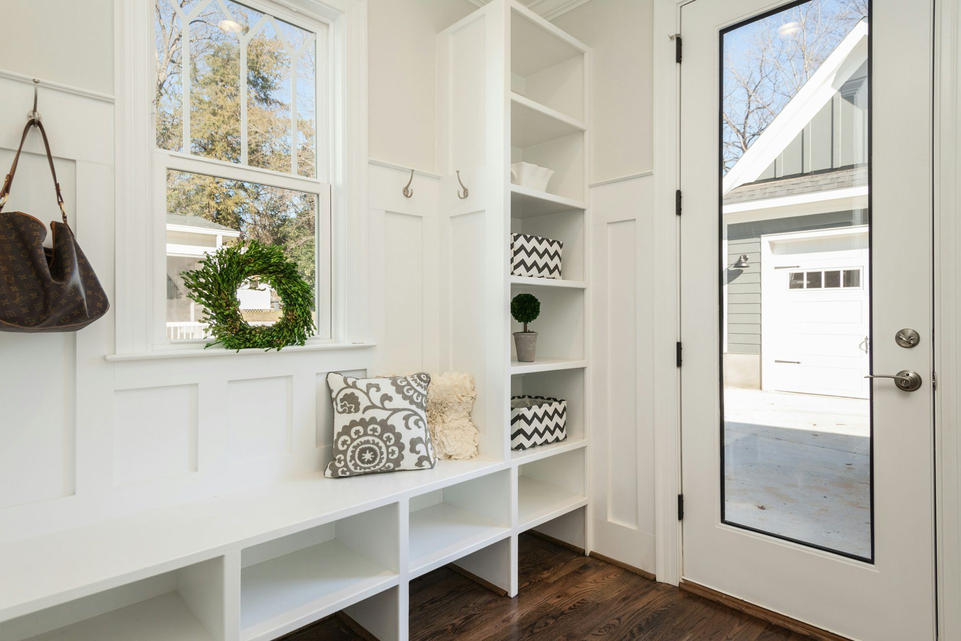 Custom shelving and bench seating installed as part of a carpentry project in a Boise home