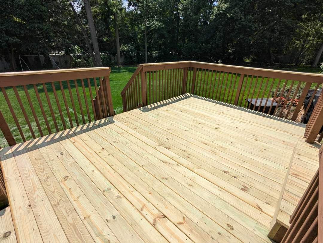 A1 Handyman professional staining a wooden deck in Meridian