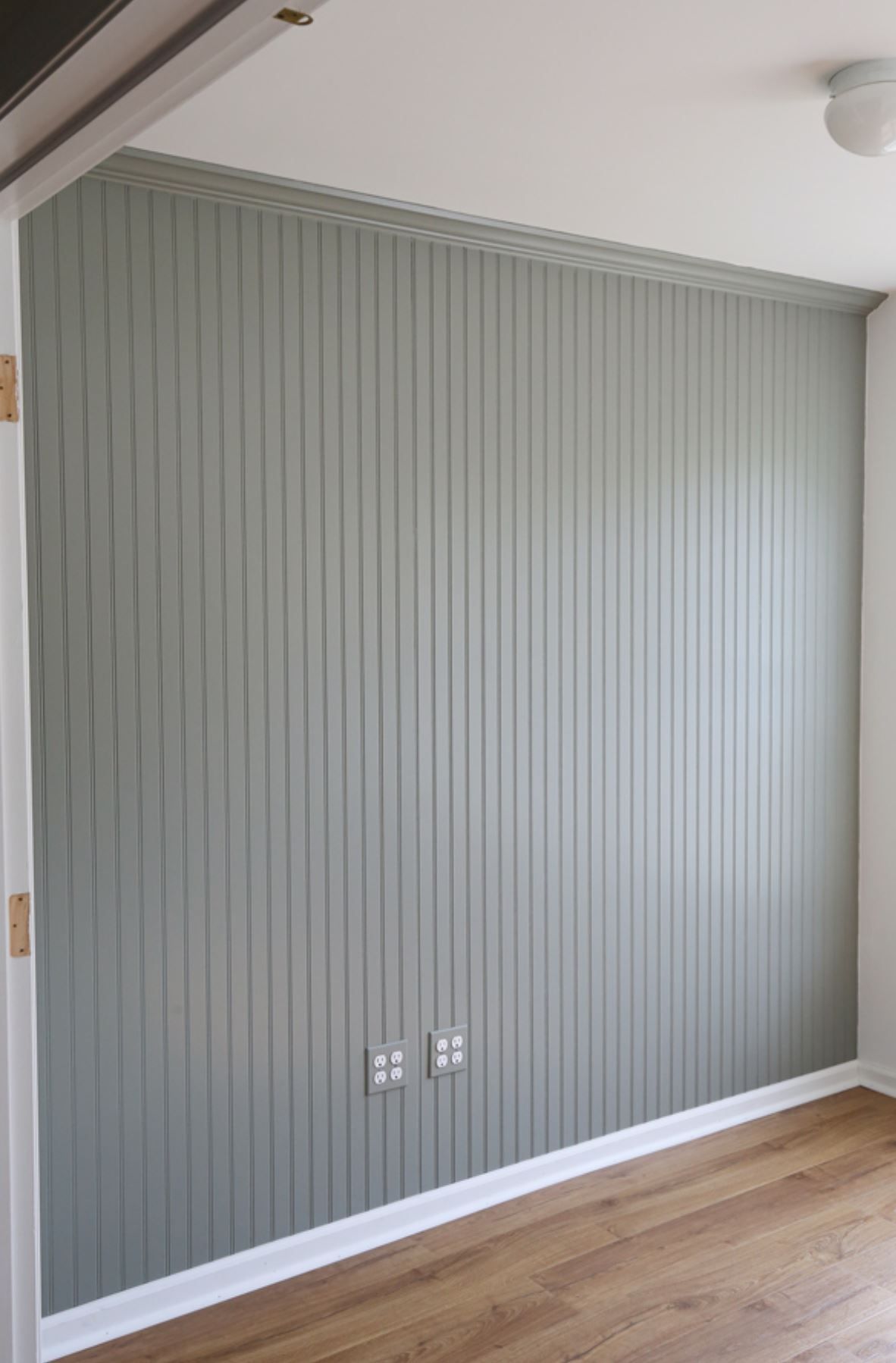 Newly installed vertical beadboard paneling in a bright Boise, ID by A1 Handyman