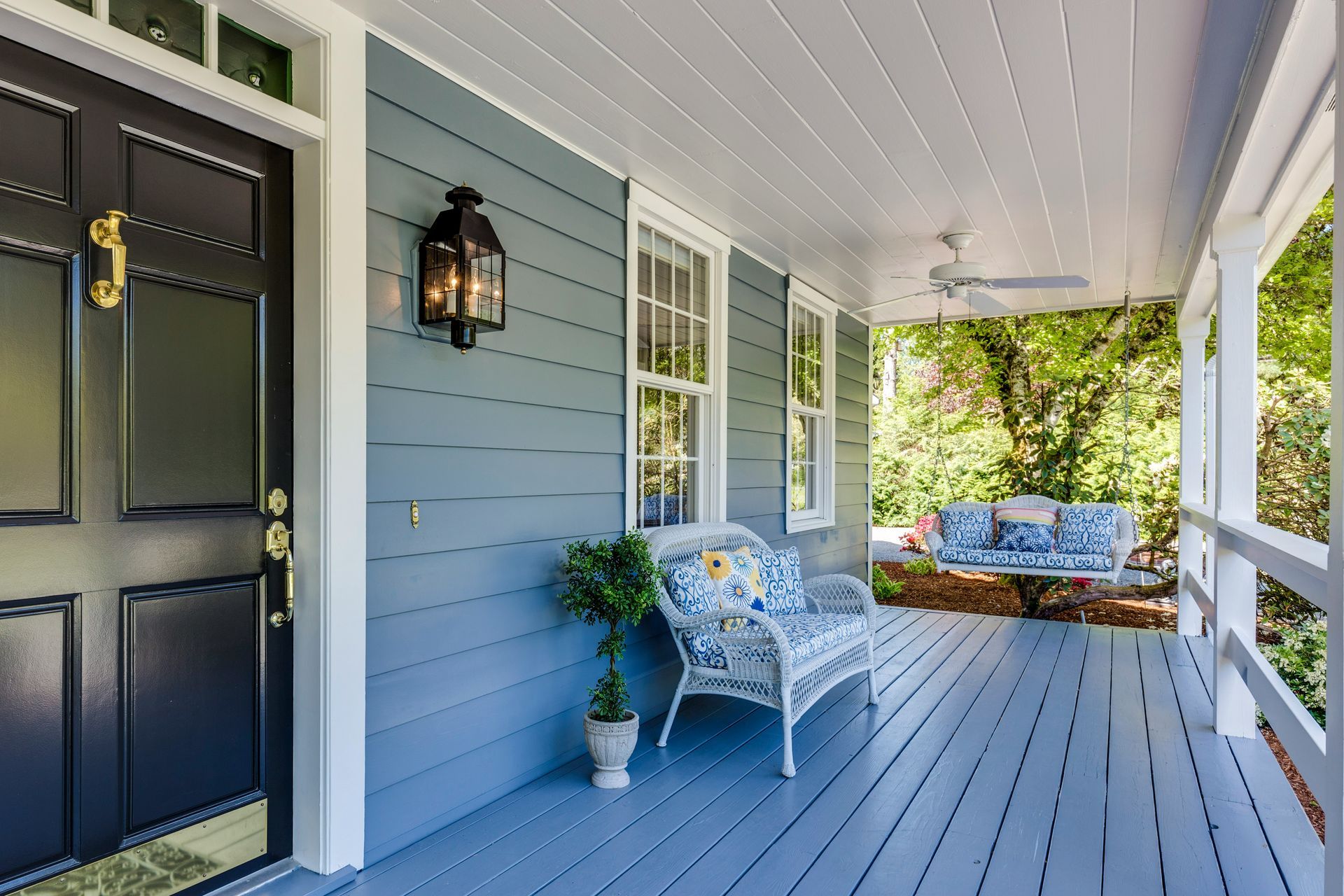 Front porch of a Boise, Idaho home with painted siding, trim, and covered entry way